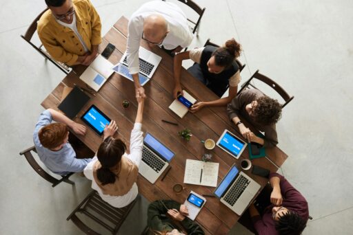 meeting with laptops and tablets